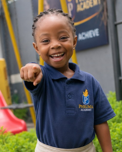 Young learner smiling with a camera